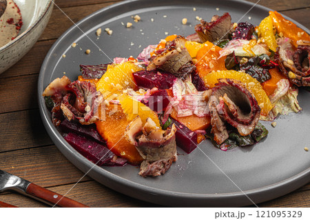 Portion of beef with pumpkin and beets Portion of beef with pumpkin and beets 121095329