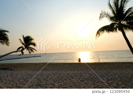 Silhouette of palm trees Beautiful sunset on the tropical sea beach background for travel in holiday relax time, Silhouette of palm trees Beautiful sunset on the tropical sea beach background for travel in holiday relax time, 121095450