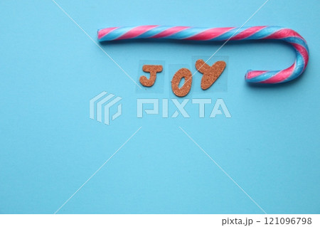 Merry Christmas card. The inscription is joy and candy cane. 121096798