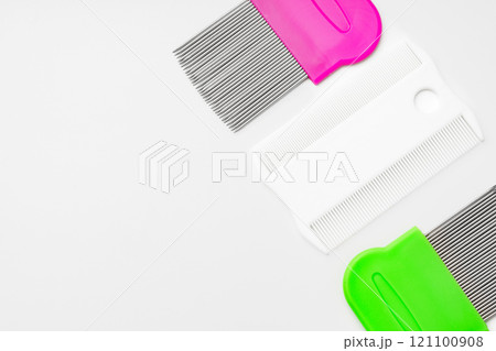 Colorful plastic and metal combs on a white background 121100908