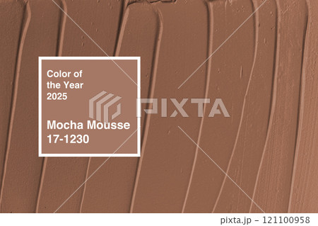 Mocha Mousse color swatch representing the color of the year for 2025 displayed on a textured background 121100958
