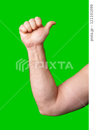 Hand with thumb raised in approval against a bright green background Hand with thumb raised in approval against a bright green background 121101099