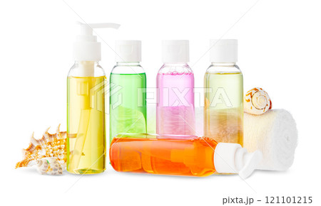 Assorted skincare products displayed on a white surface with a seashell 121101215