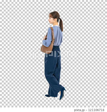 The back view of a woman walking in casual wear. A transparent full-body photo PNG precisely cut by hand The back view of a woman walking in casual wear. A transparent full-body photo PNG precisely cut by hand 121106718