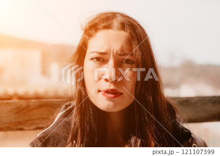 Woman Portrait Expression Serious Close-up Outdoors Woman Portrait Expression Serious Close-up Outdoors 121107399