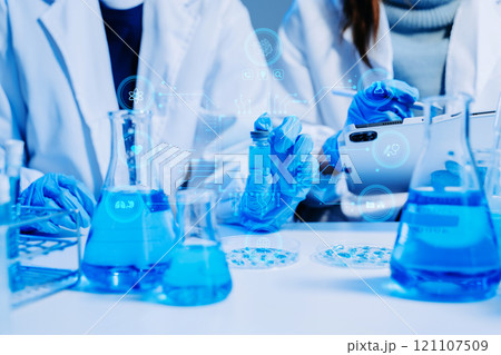 Scientist two woman with tablet and laptop, laboratory and ecofriendly science. Agriculture, research and scientists Scientist two woman with tablet and laptop, laboratory and ecofriendly science. Agriculture, research and scientists 121107509