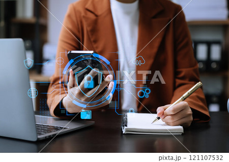Cybersecurity and privacy concepts to protect data. Lock icon and network security technology. Man protecting personal data on smartphone tablet, virtual screen 121107532
