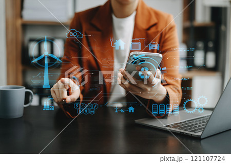ESG concept of environmental, Green ethical business preserving resources, reducing CO2, Business person team working on laptop virtual smartphone ESG concept of environmental, Green ethical business preserving resources, reducing CO2, Business person team working on laptop virtual smartphone 121107724