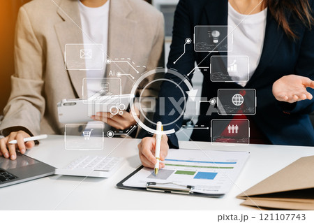 Business team partnership meeting concept. Business hand using laptop, tablet and smartphone Digital marketing media mobile app in virtual icon 121107743