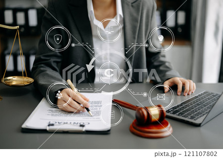 Copyright or patent concept, Person hand using laptop computer, tablet and smartphone with virtual screen copyright icon trademark, Creation ownership against piracy 121107802