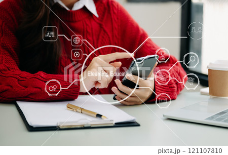 Person who attends online lessons on a virtual screen tablet. E-learning education and online webinar. Education internet Technology. 121107810