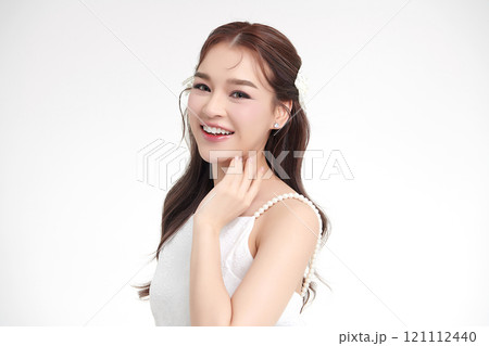 Beautiful young asian woman with clean fresh skin on white background, Face care, Facial treatment, Cosmetology, beauty and spa, Asian women portrait. 121112440