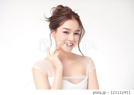 Beautiful young asian woman with clean fresh skin on white background, Face care, Facial treatment, Cosmetology, beauty and spa, Asian women portrait. 121112451