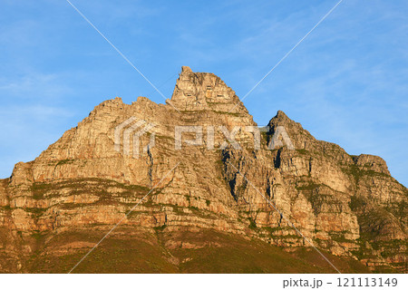 Landscape view of Table Mountain in Cape Town, South Africa against blue sky with copy space. Travel and tourism of famous landmark, rocky and rough terrain. Holiday and vacation abroad and overseas Landscape view of Table Mountain in Cape Town, South Africa against blue sky with copy space. Travel and tourism of famous landmark, rocky and rough terrain. Holiday and vacation abroad and overseas 121113149