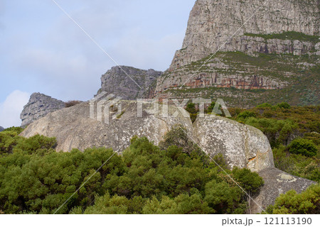 Lions Head. Landscape view of Lions Head in Cape Town, South Africa during a day. Beautiful mountains against a cloudy sky. Travelling and exploring mother nature through hiking adventures in summer. Lions Head. Landscape view of Lions Head in Cape Town, South Africa during a day. Beautiful mountains against a cloudy sky. Travelling and exploring mother nature through hiking adventures in summer. 121113190