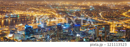 Wide angle of a city at night from above. Futuristic panorama of the lights of Cape Town at sunset. .A modern urban landscape of an illuminated city. High angle view from Signal Hill in South Africa Wide angle of a city at night from above. Futuristic panorama of the lights of Cape Town at sunset. .A modern urban landscape of an illuminated city. High angle view from Signal Hill in South Africa 121113523