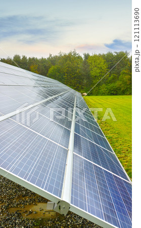 Solar power renewable source in Denmark. Photovoltaic solar cell panels as a natural energy source. Blue solar panels generate electricity in solar power technology, alternative energy from nature Solar power renewable source in Denmark. Photovoltaic solar cell panels as a natural energy source. Blue solar panels generate electricity in solar power technology, alternative energy from nature 121113690