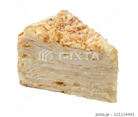 Piece of Napoleon cake close-up on white. Isolated 121114491