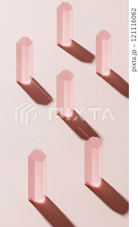 Geometric pink cylinders casting shadows on light background. Geometric pink cylinders casting shadows on light background. 121116062