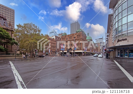 Intersection view with Queen Victoria Building, showcasing its ornate architecture and iconic domes in Sydney Intersection view with Queen Victoria Building, showcasing its ornate architecture and iconic domes in Sydney 121116718