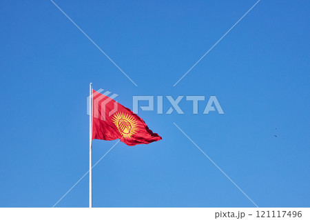 The main symbol of the Kyrgyz Republic. Kyrgyzstan Flag fluttering in the wind 121117496