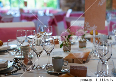 Elegant Table Setting with Pink and White Floral Centerpiece for Special Occasions and Celebrations Elegant Table Setting with Pink and White Floral Centerpiece for Special Occasions and Celebrations 121118015