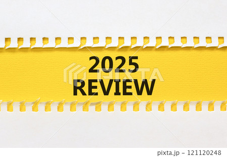 Planning 2025 review new year symbol. Concept words 2025 Review on beautiful yellow paper. Beautiful white background. Business 2025 review new year concept. Copy space. Planning 2025 review new year symbol. Concept words 2025 Review on beautiful yellow paper. Beautiful white background. Business 2025 review new year concept. Copy space. 121120248