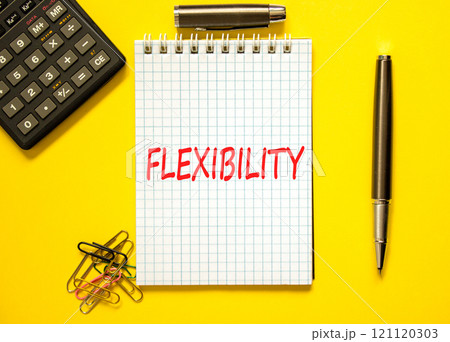 Flexibility symbol. Concept word Flexibility on beautiful white note. Beautiful yellow paper background. Black calculator. Black pen. Business flexibility concept. Copy space. Flexibility symbol. Concept word Flexibility on beautiful white note. Beautiful yellow paper background. Black calculator. Black pen. Business flexibility concept. Copy space. 121120303