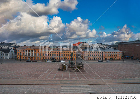 Senate Square in Helsinki, Finland, features the Alexander II statue, surrounded by neoclassical buildings like the Government Palace under dramatic clouds. Senate Square in Helsinki, Finland, features the Alexander II statue, surrounded by neoclassical buildings like the Government Palace under dramatic clouds. 121121710