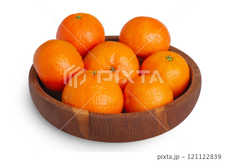 Tangerines in a wooden plate isolate on a white background. Fruits, citrus fruits Tangerines in a wooden plate isolate on a white background. Fruits, citrus fruits 121122839