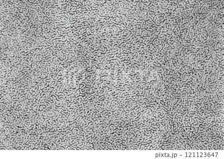 Gray color fabric cloth with short haired fluffy and soft abstract texture background. Photo silver colored surface level textile material, background texture of fabric for design element. Copy space Gray color fabric cloth with short haired fluffy and soft abstract texture background. Photo silver colored surface level textile material, background texture of fabric for design element. Copy space 121123647