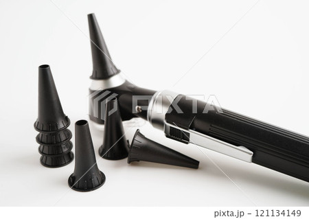 Otoscope isolated on white background for otolaryngologist or ENT physician doctor examining senior patient ear, hearing loss problem. 121134149