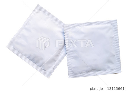 White latex condom packages mockup isolated white background, contraception and safe sex concept White latex condom packages mockup isolated white background, contraception and safe sex concept 121136614