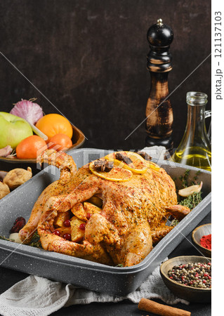 Roasted duck with spices and fresh vegetables for a festive dinner gathering 121137103