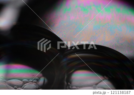 Silver liquid perfect forms on black background, fantastic abstraction, surreal water shapes, rainbow reflection,  121138187