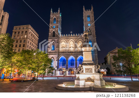 Montreal, Quebec, Canada - August 18 2021 : Night view of Place d'Armes in Old Montreal. Notre-Dame Basilica. Maisonneuve Monument. Montreal, Quebec, Canada - August 18 2021 : Night view of Place d'Armes in Old Montreal. Notre-Dame Basilica. Maisonneuve Monument. 121138268
