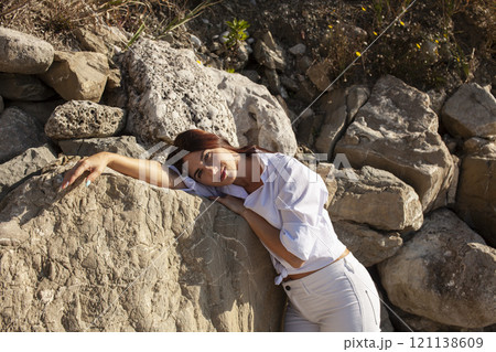 young pretty brunette woman on sea coast, lifestyle people concept close up young pretty brunette woman on sea coast, lifestyle people concept close up 121138609