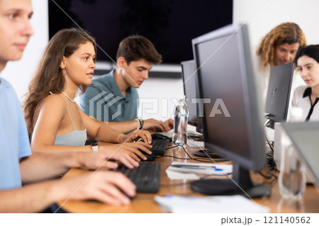 Female student is engrossed 121140562
