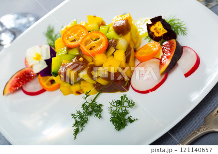 Raw tuna tartare with mango and avocado 121140657