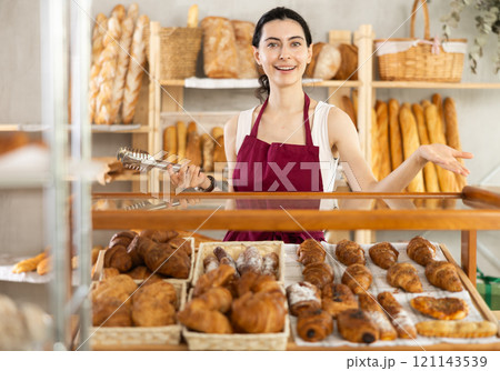 Armenian young woman work selling in family bakery shop Armenian young woman work selling in family bakery shop 121143539