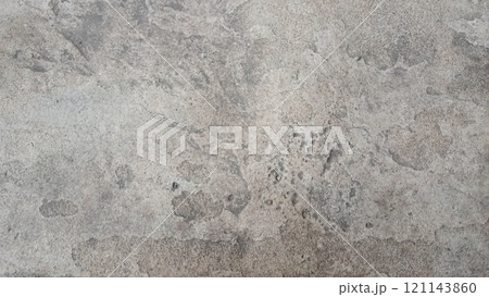 Close up of a weathered concrete surface with visible pores and grains. Ideal for industrial or rustic designs 121143860