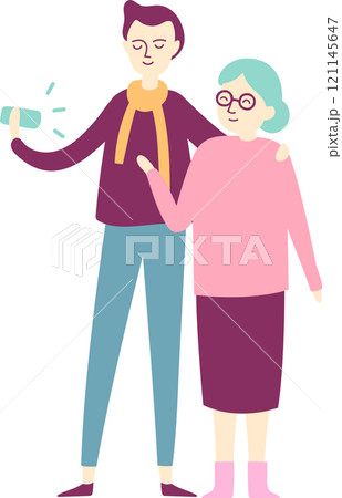 Young caregiver showing smartphone to elderly woman with arm around her shoulder, representing the bond between generations and the sharing of new technologies 121145647