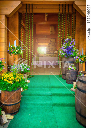 Beautiful romantic elegant wedding decor for a luxury dinner in restaurant. Modern floral design for outdoor wedding in rustic style 121146065