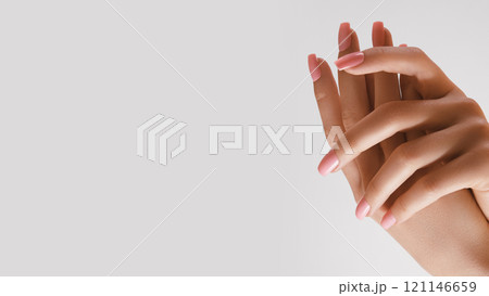 Beautiful Woman Hands. Soft skin, spa skincare concept. Female Hands Applying Cream or Lotion. Hands with pink manicure Beautiful Woman Hands. Soft skin, spa skincare concept. Female Hands Applying Cream or Lotion. Hands with pink manicure 121146659