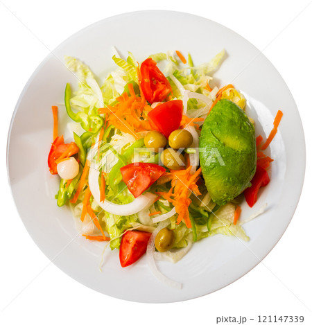 Fresh vegetable salad served with avocado 121147339