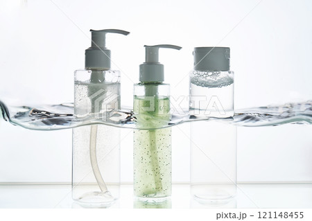 A bottle of cosmetic product in water. A bottle of cosmetic product in water. 121148455