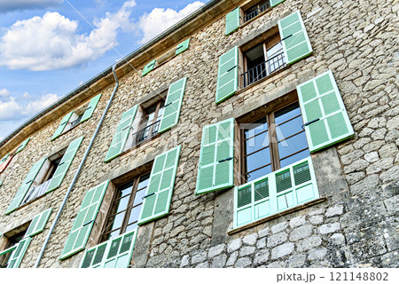 Beautiful window views of the famous town of Valldemosa, Mallorca, Balearic Islands, Spain Beautiful window views of the famous town of Valldemosa, Mallorca, Balearic Islands, Spain 121148802