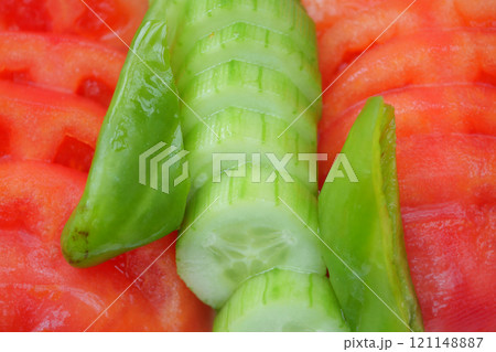 Sliced Fresh Cucumber and Watermelon Salad for a delightful and vibrant appetizer option 121148887