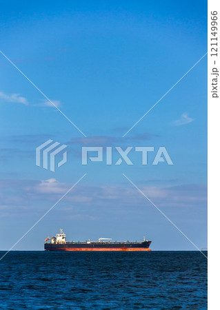 Oil tanker ship on sea with copy space on heaven and water, sunny day Oil tanker ship on sea with copy space on heaven and water, sunny day 121149966