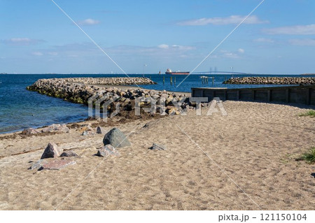 Oresund bridge seen from Amager beach park, Copenhagen, Denmark, sunny day 121150104